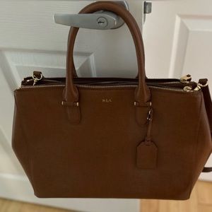 Ralph Lauren pocketbook, great condition. has no rips no stain